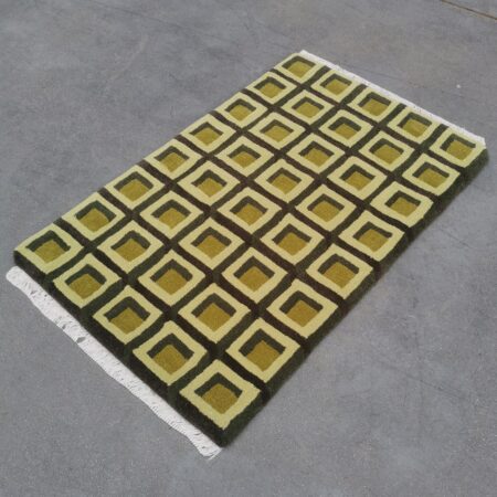tapis effet carreaux vintage avec des nuances de vert